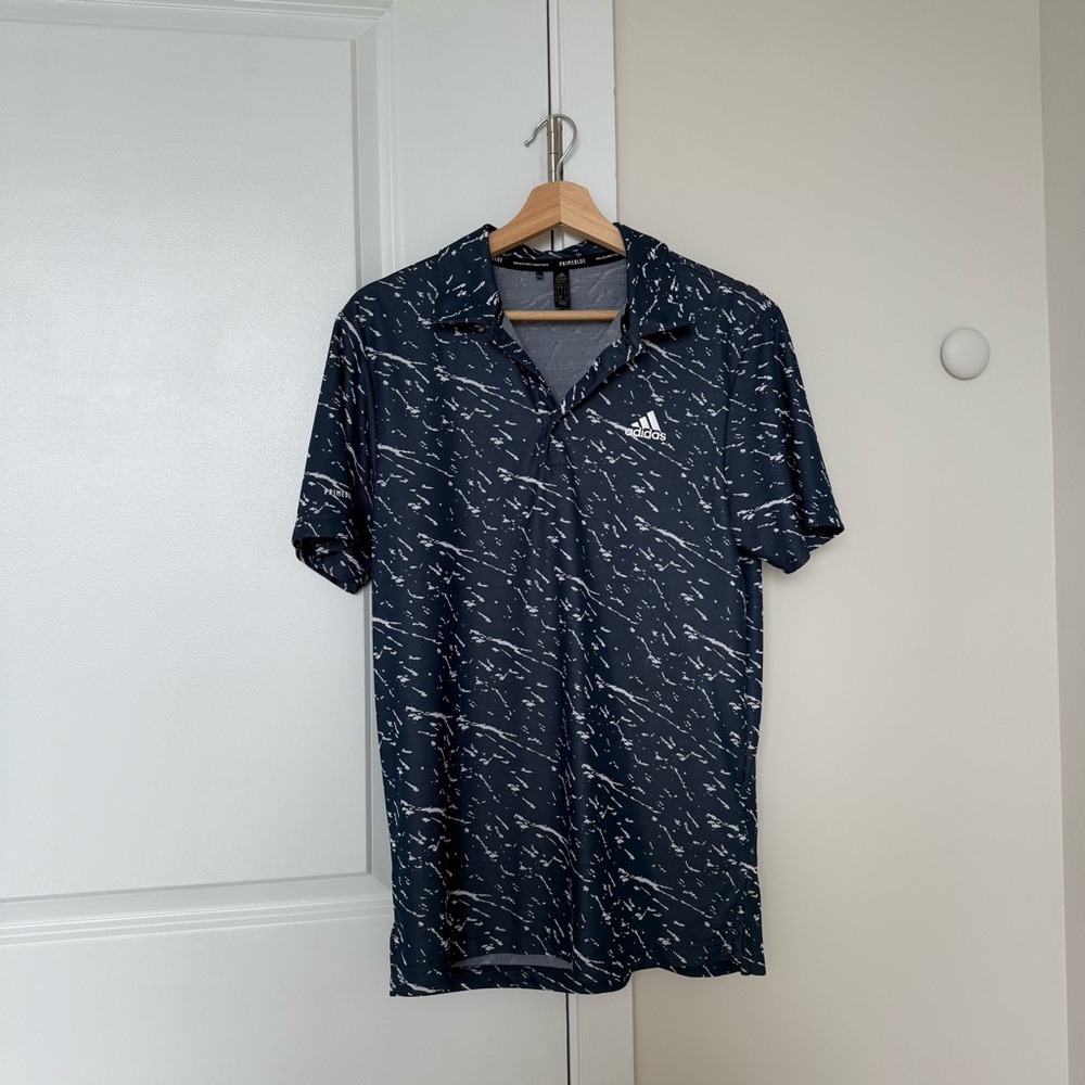 Adidas Blue and White Polo Shirt with Dynamic Pattern